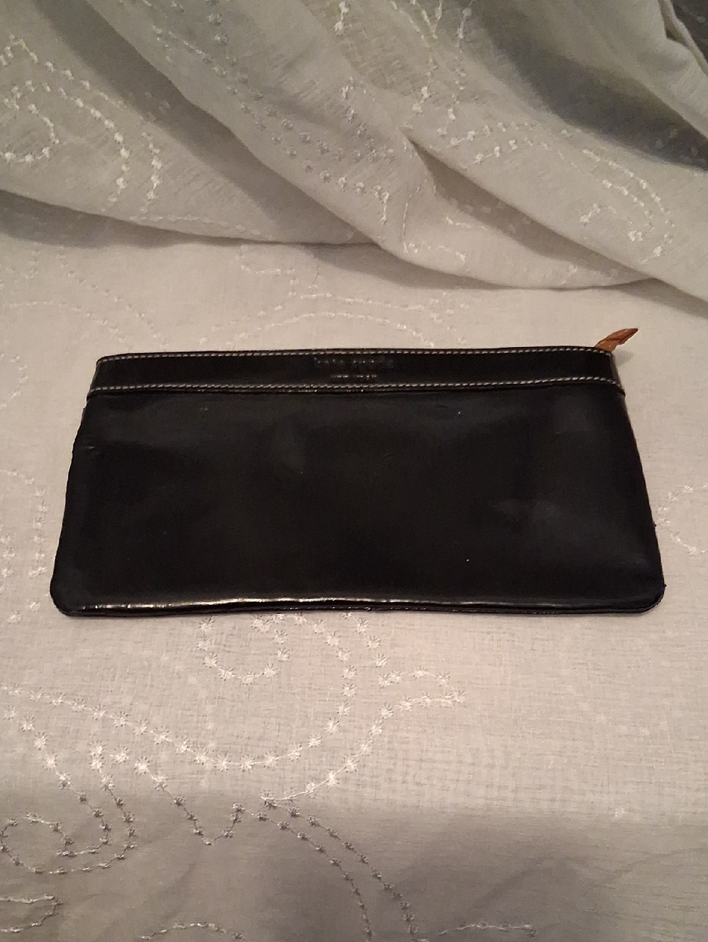 kate spade Black Patent Leather Wristlet with polka dot lining